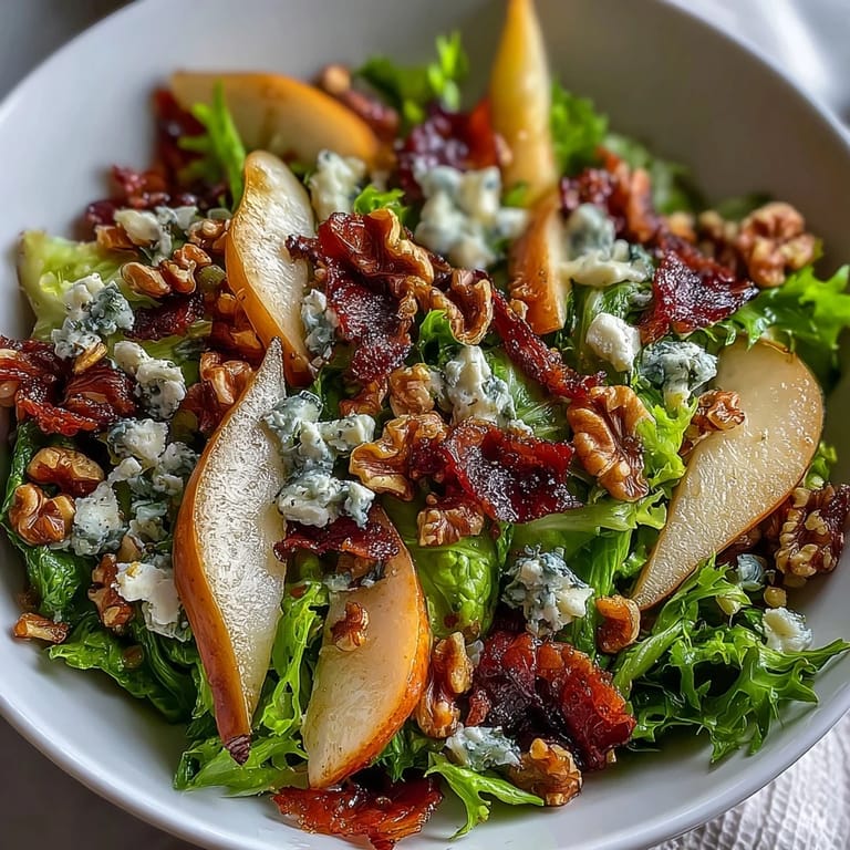 Tossed with walnuts and a honey-Dijon vinaigrette, the frisée, pear, blue cheese, and crispy prosciutto salad shines as a light lunch.