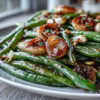 Roasted Garlic Green Beans with Lemon Zest, a savory and aromatic side dish perfect for Easter dinner.